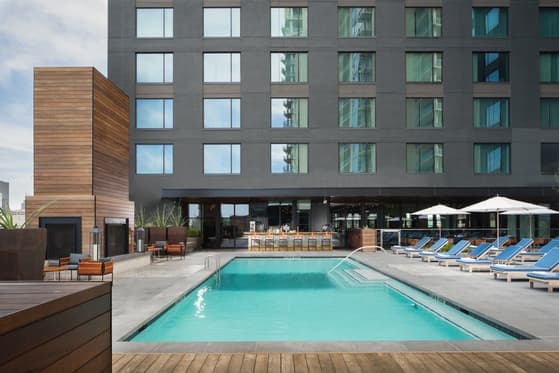 Hotel Van Zandt's rooftop pool with downtown Austin skyline views on Rainey Street