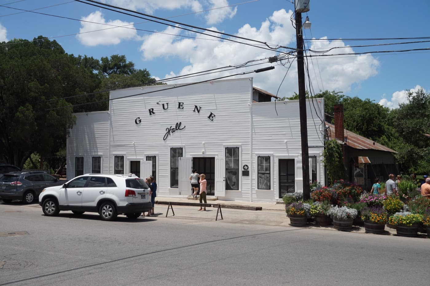 The white wooden facade of Gruene Hall, the oldest continually operating dance hall in Texas