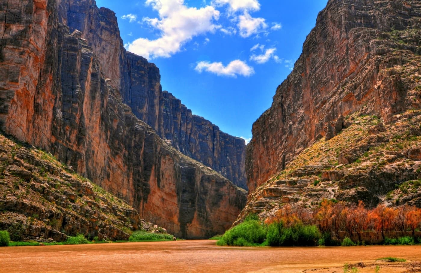 The Rio Grande flowing out between the sheer rock walls of Santa Elena Canyon in Big Bend National Park