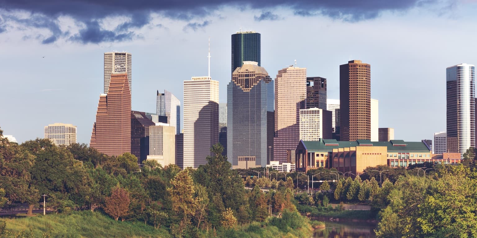 The downtown Houston skyline seen from the west across Buffalo Bayou