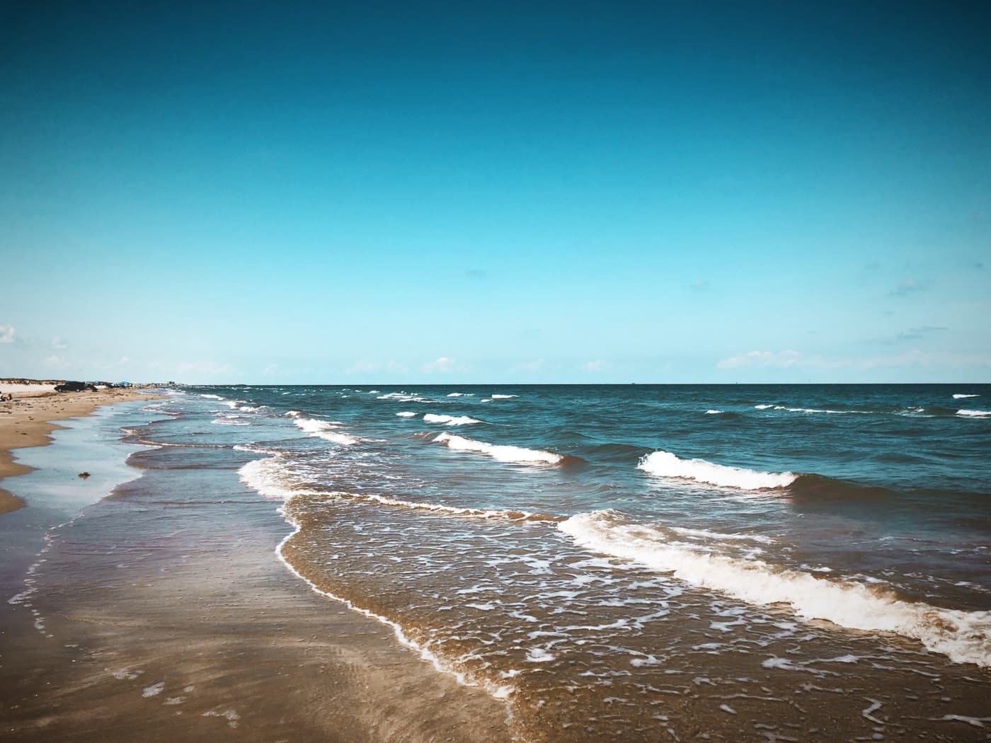 Open sand and low dunes at the beach in Mustang Island State Park on the Texas coast