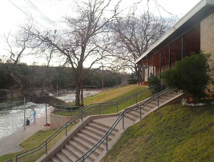 Barton Springs Pool in Austin — a 200-yard spring-fed swimming pool maintaining 68-70°F year-round