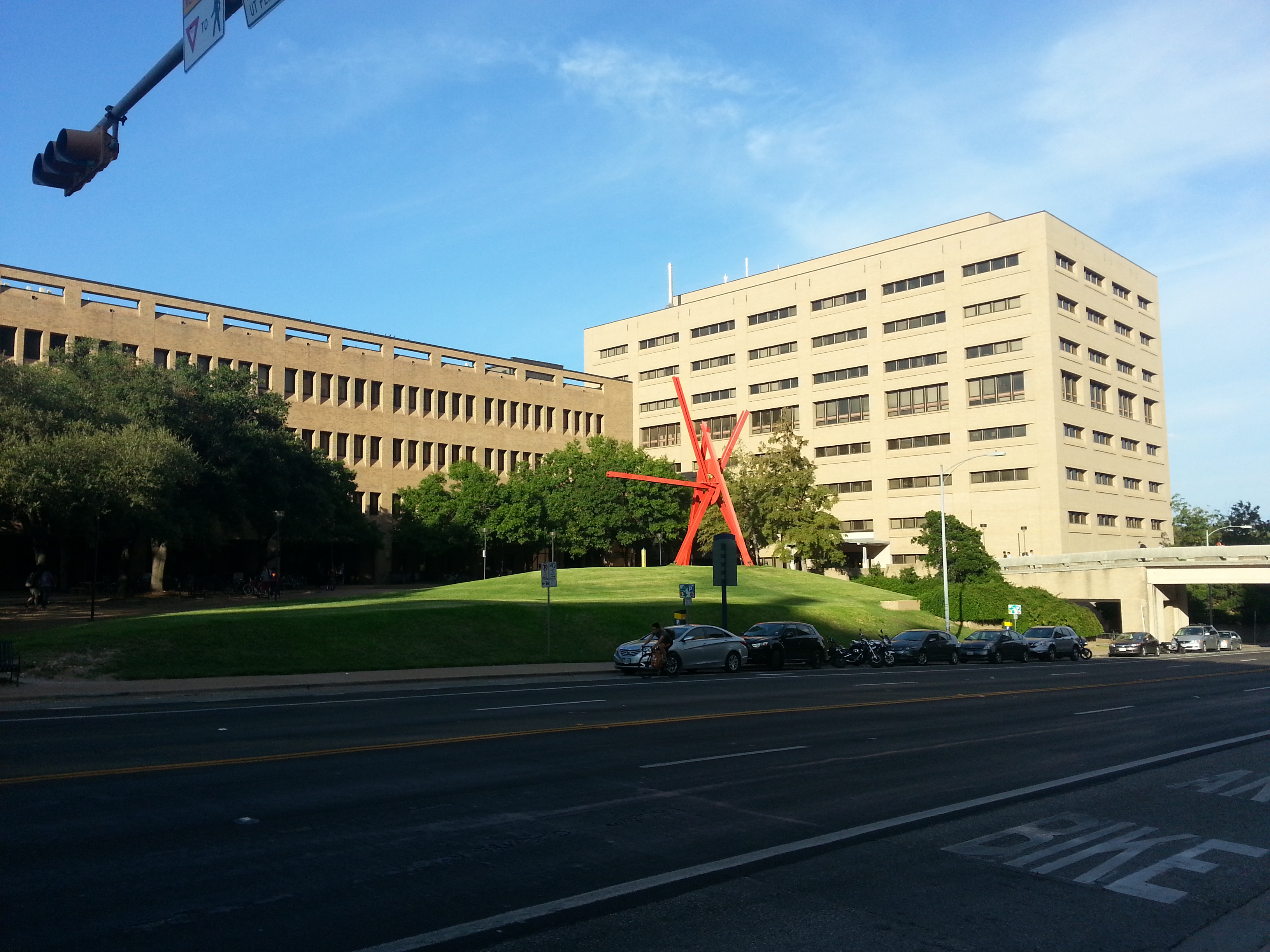 Mark di Suvero's Clock Knot, a 41-foot red painted-steel sculpture on the University of Texas campus