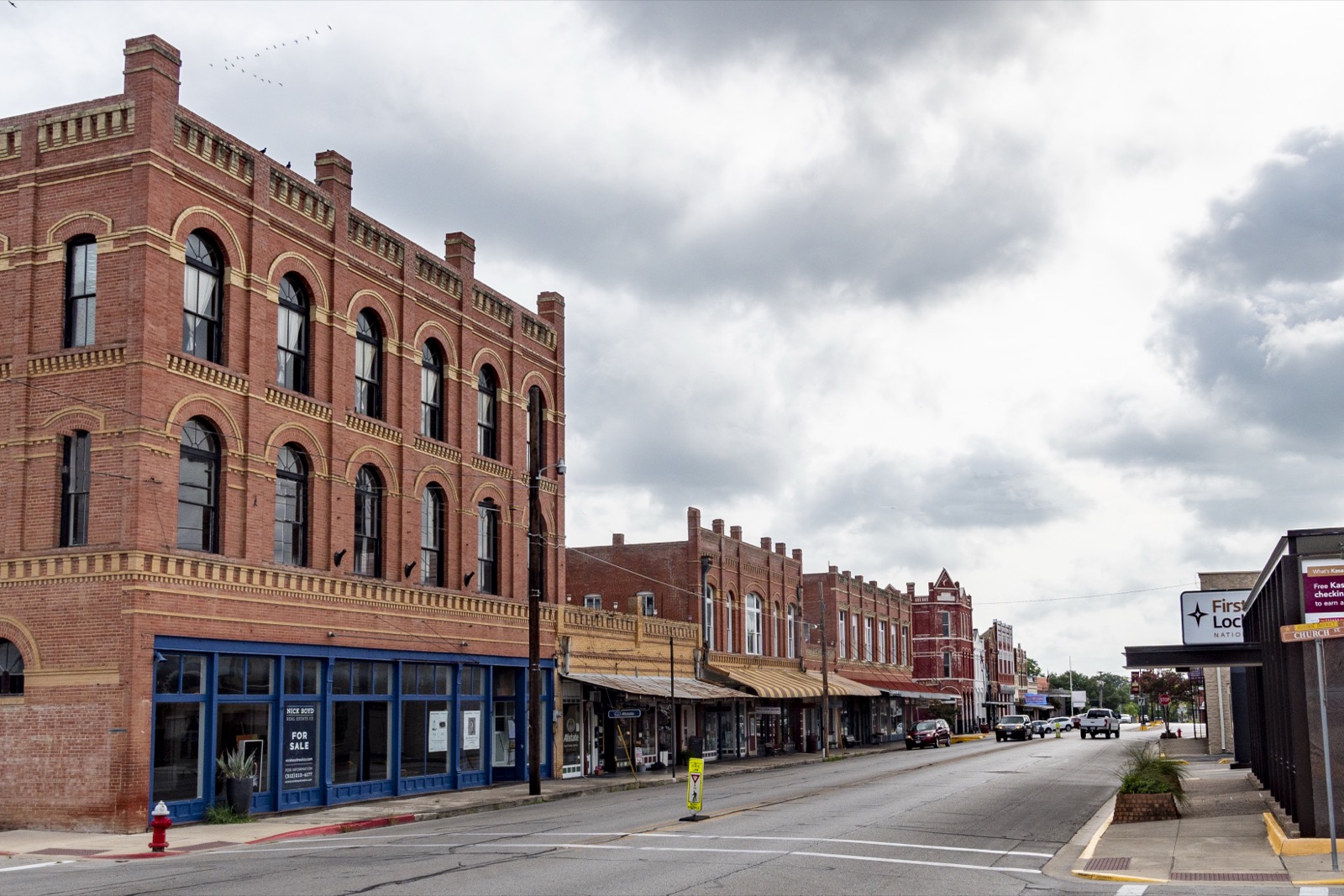 Downtown Lockhart, Texas, showing the authentic small-town architecture along West San Antonio Street where scenes from Bernie were filmed