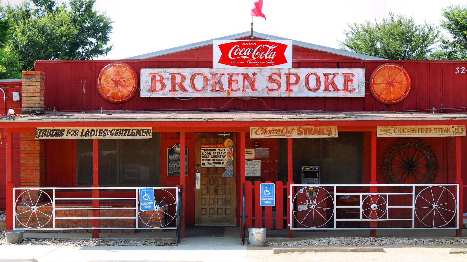 The Broken Spoke honky-tonk in Austin, Texas, representative of the dive bars and neon-lit roadhouses that define Blood Simple's Central Texas atmosphere
