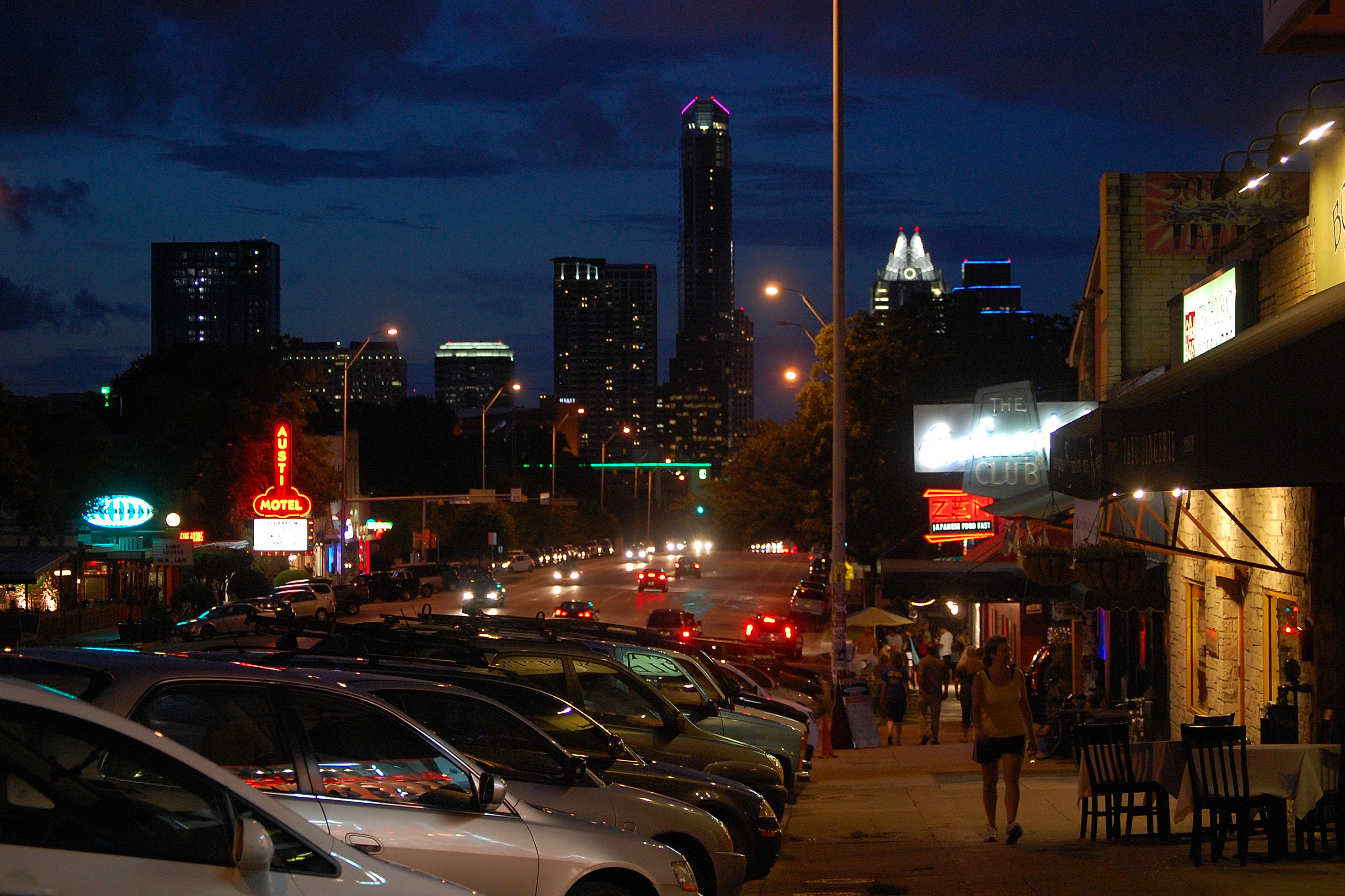 South Congress Avenue street scene in Austin, lined with boutiques, restaurants, and colorful murals