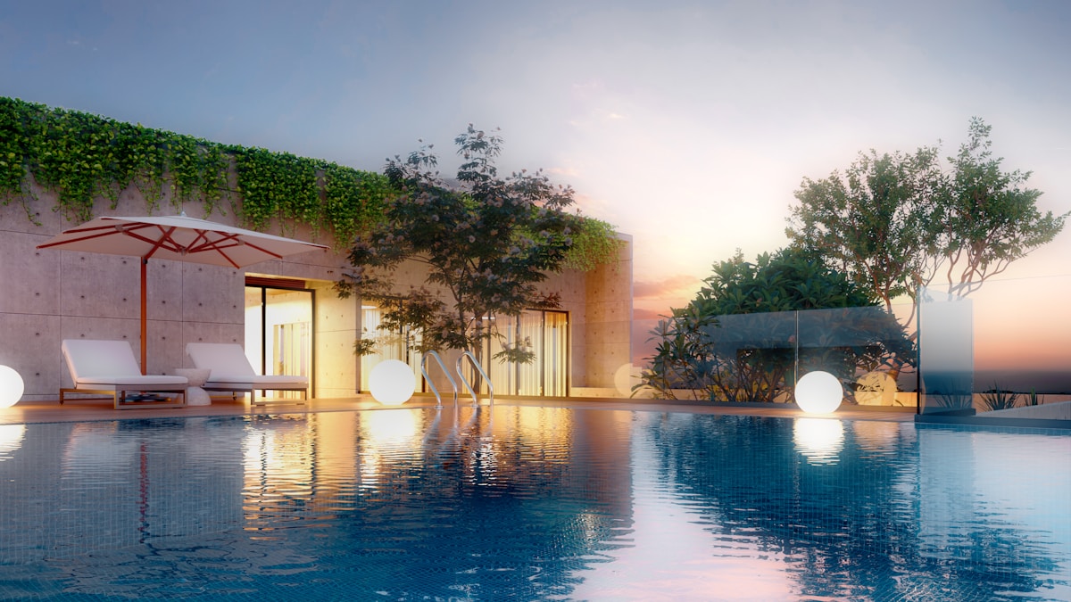 Resort infinity pool at golden hour — the kind of late-afternoon stillness that defines an Austin wellness retreat
