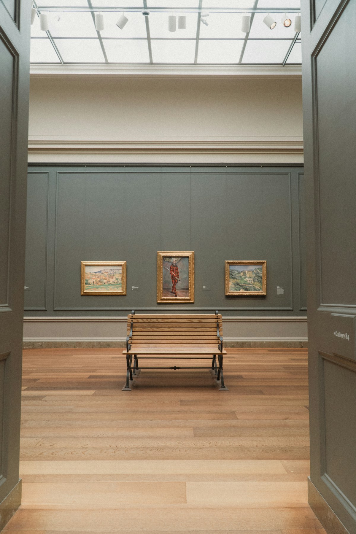 A quiet museum gallery — donating inherited art to an institution ensures it will be preserved and appreciated by the public