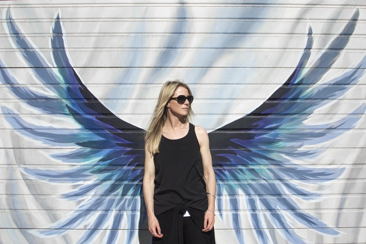 Interactive angel wings mural in Austin's 2nd Street District, part of Kelsey Montague's global 
