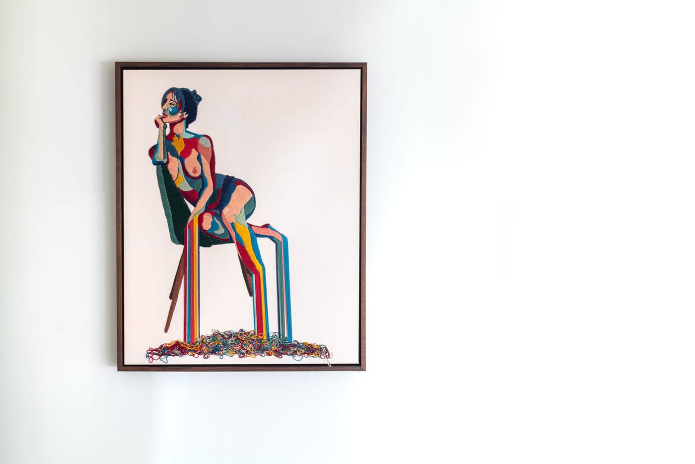 A figurative painting by Mary Rochford — a seated figure rendered in bold, saturated color