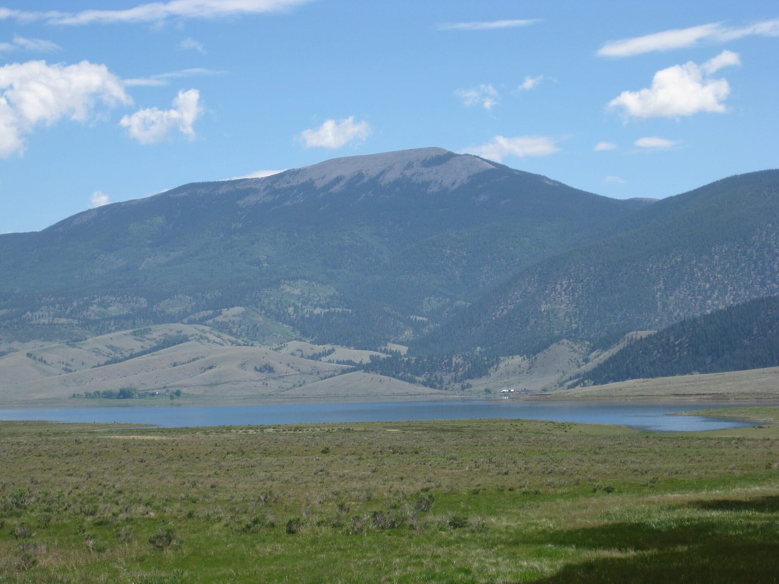 Eagle Nest Lake spreading across the high mountain valley beneath distant peaks