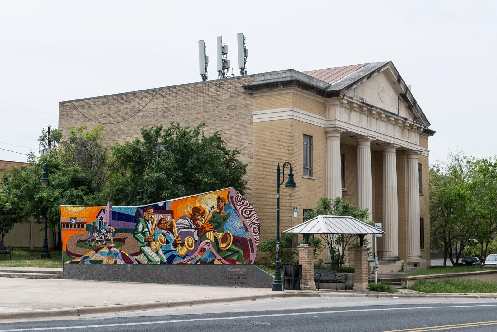 Colorful bungalows and patio bars along a walkable East Austin street