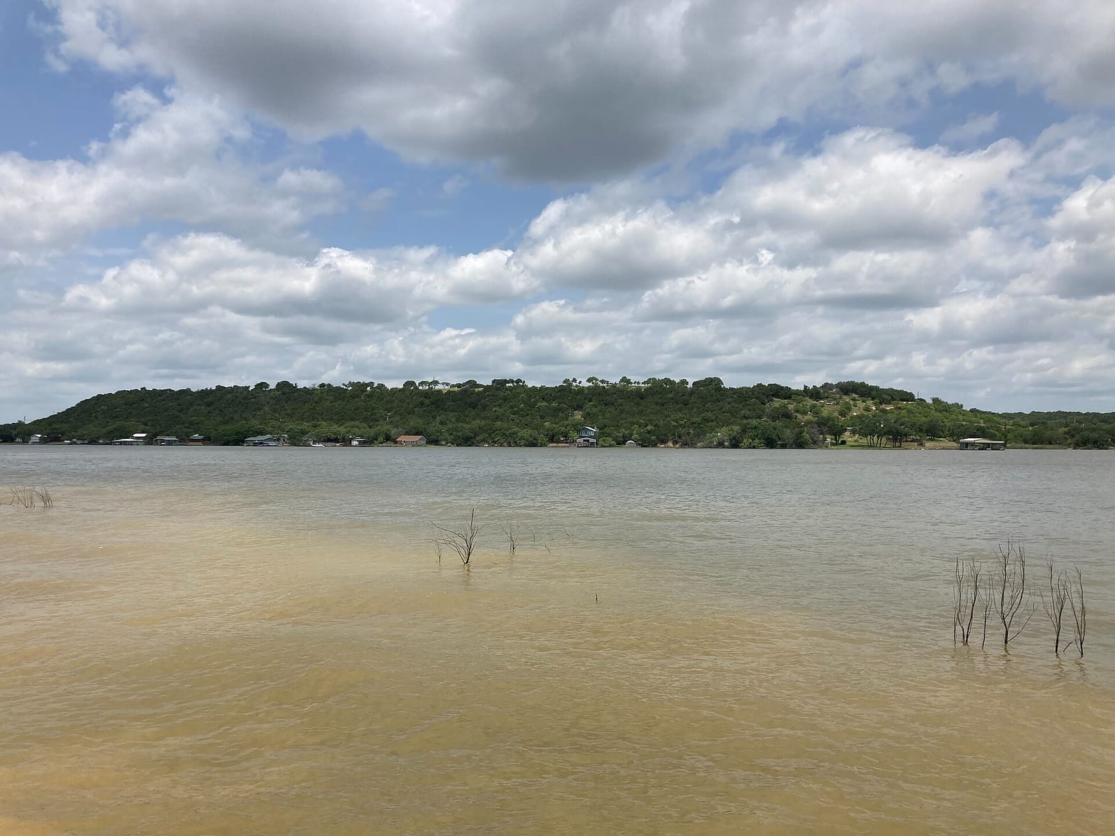 The twin limestone cliffs of Hell's Gate framing clear water at Possum Kingdom Lake