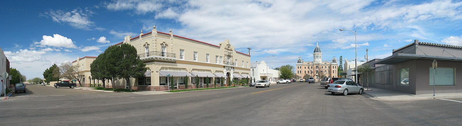 Adobe buildings and quiet desert streets under a big sky in Marfa, Texas